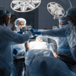 surgeons getting ready for surgery in operating room